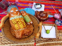 Colada morada and decorated bread guaguas a duo of combination of flavors and traditions.